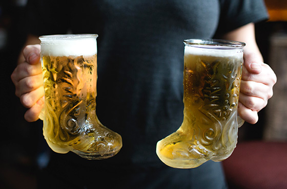 Two glass boots of beer